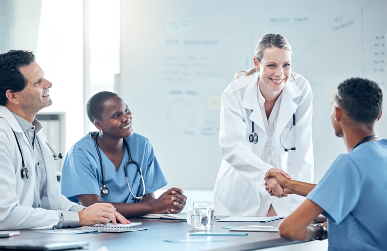 handshake-doctors-meeting-or-diversity-team-happy-2026-01-09-10-29-07-utc